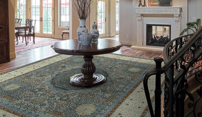 an wooden thick heavy table on top of the rug