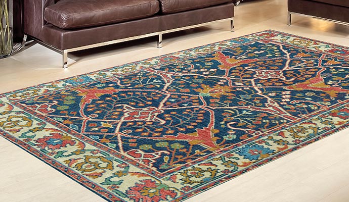  a large clean,ornate rug is laid out flat on a white tile floor in a living area