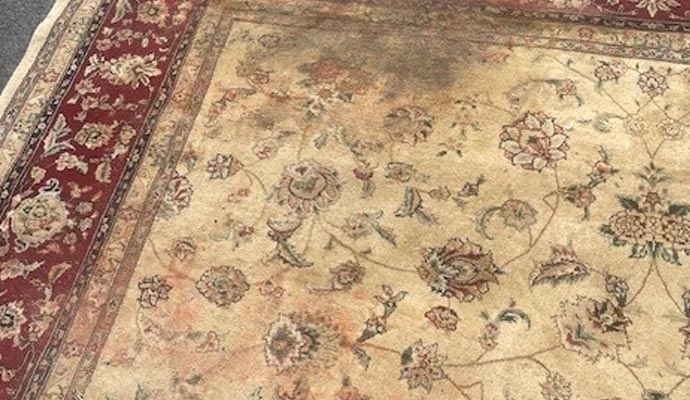 Color damaged rug.